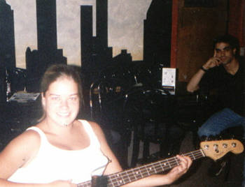 Amy McGillicuddy on the 1996 American Standard Feneder Jazz Bass, Cosmic Debris Drummer Jason "Bob Dylan's Grandmother" is in "AWE"